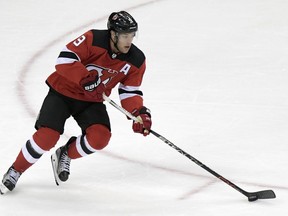 FILE - In this Sept. 17, 2018, file photo, New Jersey Devils left wing Taylor Hall skates with the puck during the second period of an NHL hockey game against the New York Rangers in Newark, N.J. Coming off their worst season in nearly 30 years, the Devils shocked the NHL this past season by returning to the postseason for the first time since 2011-12.