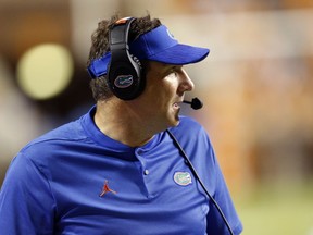 FILE - In this Sept. 22, 2018, file photo, Florida head coach Dan Mullen watches the first half of an NCAA college football game against Tennessee in Knoxville, Tenn. Mullen will forever be tied to Starkville, Miss. It is where he landed his first head coaching job. It is where his two children were born. It is the place he called home for nearly a decade.