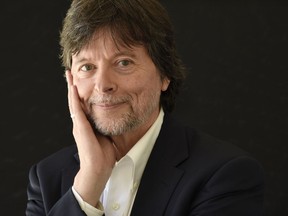 FILE - In this July 28, 2017, file photo, Ken Burns poses for a portrait during the 2017 Television Critics Association Summer Press Tour in Beverly Hills, Calif. After spearheading an 18-hour documentary on the Vietnam War, Burns has turned to a more personal subject, one that knows him very intimately, too. Burns tackles the famed Mayo Clinic in his next film, exploring the history of the innovative Minnesota-based hospital. It's not just cold history -- he's also a patient. "The Mayo Clinic: Faith, Hope, Science" starts with the hospital's birth in 1883 and ends with its modern-day state-of-the-art facilities over several campuses.