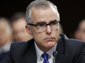 FILE - In this June 7, 2017, file photo, FBI acting director Andrew McCabe listens during a Senate Intelligence Committee hearing about the Foreign Intelligence Surveillance Act, on Capitol Hill in Washington. McCabe, the former FBI deputy director fired this year amid repeated attacks from President Donald Trump and a critical Justice Department report, has a book deal. St. Martin's Press announced Tuesday, Sept. 18, 2018, that "The Threat: How the FBI Protects America in the Age of Terror and Trump" will come out Dec. 4.