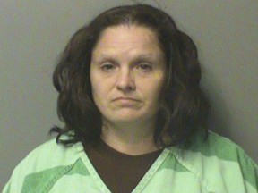 This undated photo provided by the Polk County Jail in Iowa, shows Jessica Henderson, who is accused of binding her children by the hands or feet to keep them under control. Polk County court records said Henderson is charged with child endangerment. (Polk County Jail via AP)