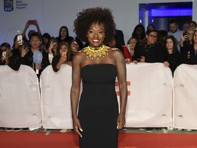 FILE - In this Sept. 8, 2018, file photo, Viola Davis attends the premiere for "Widows" on Day 3 of the Toronto International Film Festival at Roy Thomson Hall in Toronto. Davis told The New York Times she has regrets about her role as a maid in the 2011 film "The Help."