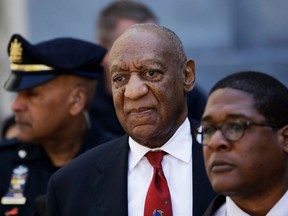 In this April 26, 2018, file photo, Bill Cosby, center, leaves the the Montgomery County Courthouse in Norristown, Pa. Cosby is due in court Monday, Sept. 24, for a two-day sentencing hearing that follows his conviction on three counts of aggravated indecent assault.