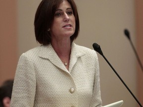 FILE - In this Aug. 31, 2012, file photo, state Sen. Mimi Walters, R-Lake Forest, speaks at the Capitol in Sacramento, Calif. One provision of the Republican tax overhaul looms large in several tight congressional races this fall. Walters, a Republican, embraces the tax law while reminding voters in her Orange County district that she helped convince House Speaker Paul Ryan not to eliminate the favored deduction altogether.