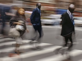 People walk towards the U.N. headquarters on Friday, Sept. 28, 2018, in New York. At the U.N. General Assembly this year, leader after leader mused about the challenges of an increasingly fragmented planet and how the friction of modern life can mesh with old suspicions that can now be amplified in an instant. In short: Most of us humans are led by people struggling to figure out the same dizzying world that vexes the rest of us.