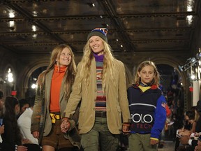 Models walk the runway at the Ralph Lauren 50th Anniversary Fashion Show during New York Fashion Week, Friday, Sept. 7, 2018.