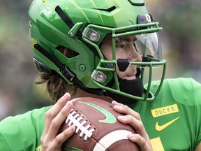 FILE - In this Saturday, Sept. 8, 2018, file photo, Oregon quarterback Justin Herbert went 20-of-26 with 250 yards, four touchdowns and no picks in their 62-14 win against Portland State during an NCAA college football game in Eugene, Ore. On the latest AP Top 25 College Football Podcast, guest Chantel Jennings previews the Pac-12's big game and gives the back story on Ducks star quarterback Justin Herbert.