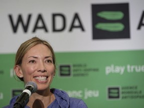 FILE - In this June 5, 2018, file photo, Beckie Scott, World Anti-Doping Agency athlete committee chairperson, Beckie Scott, speaks at a news conference following the agency's first Global Athlete Forum in Calgary, Alberta. Scott told the Associated Press Saturday, Sept.15, 2018, that she left her position on the World Anti-Doping Agency's six-person compliance review committee. Her departure came after WADA made changes to some of the most stringent requirements to bring the Russian anti-doping agency back into compliance following a nearly three-year suspension.