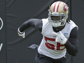 FILE - In this May 30, 2018, file photo, San Francisco 49ers linebacker Reuben Foster runs during a practice at the team's NFL football training facility in Santa Clara, Calif. San Francisco figures to get a big boost on defense from Foster, who returns this week after he was suspended for the first two games of the season for violating the league's substance abuse and personal conduct policy.