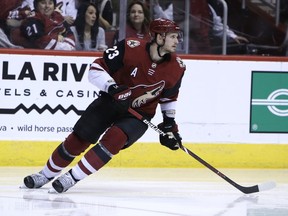 FILE - In this Jan. 16, 2018, file photo, Arizona Coyotes defenseman Oliver Ekman-Larsson (23) skates in the first period during an NHL hockey game against the San Jose Sharks in Glendale, Ariz. The Arizona Coyotes enter camp with optimism after finishing last season strong and making moves during the offseason to upgrade their roster. One was to lock up defenseman Oliver Ekman-Larsson for the next eight years.