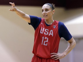 FILE - In this April 24, 2018, file photo, Diana Taurasi motions during a practice for the U.S. national women's basketball team in Seattle. The U.S. women's basketball roster is full of WNBA All-Stars and clearly the 12-member team led by Diana Taurasi, Sue Bird and Breanna Stewart will be fun to watch.