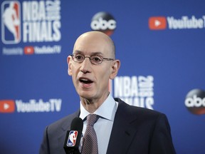 FILE - In this May 31, 2018, file photo, NBA Commissioner Adam Silver speaks at a news conference before Game 1 of basketball's NBA Finals between the Golden State Warriors and the Cleveland Cavaliers in Oakland, Calif. Silver wants all teams to hire more women, especially in leadership and supervisory positions, and is urging them to take some of the mandates that the Dallas Mavericks must now adhere to as an impetus to improve working conditions within their own organizations, according to a memo sent to all teams Friday, Sept. 21, 2018, and obtained by The Associated Press