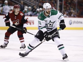 FILE - In this Feb. 1, 2018, file photo, Dallas Stars center Tyler Seguin (91) skates during the first period of an NHL hockey game Arizona Coyotes in Glendale, Ariz. Seguin has signed a $78.8 million, eight-year contract extension with the Stars, general manager Jim Nill announced  Thursday, Sept. 13, 2018.