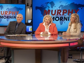 This image released by CBS shows Joe Regalbuto, Candice Bergen and Faith Ford from the comedy series, "Murphy Brown." Political, social issues and the role of journalism will be central when the sitcom, starring  Bergen as a skeptical TV reporter, returns Thursday on CBS.