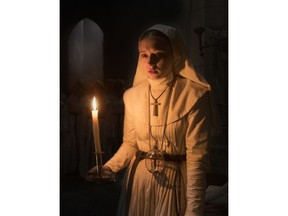 This image released by Warner Bros. Pictures shows Taissa Farmiga in a scene from "The Nun."