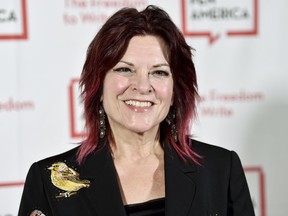 FILE - In this May 22, 2018 file photo, Rosanne Cash attends the 2018 PEN Literary Gala in New York. Cash will receive the Spirit of Americana Free Speech award from the Americana Music Association on Wednesday, Sept. 12, following in her father Johnny Cash's footsteps. He was the first artist to receive that award in 2002.