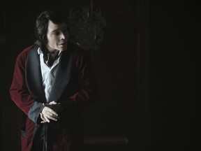 This image released by FX shows Teddy Perkins in a scene from the comedy series "Atlanta." Perkins appeared at the Emmys Monday night in the same attire as worn on the comedy-drama on the show, sporting red velvet dinner jacket, heavy white makeup, prosthetics and a bob cut wig.