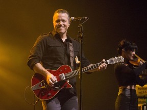 FILE - In this Feb. 6, 2018 file photo, singer-songwriter Jason Isbell performs in concert as Jason Isbell & the 400 Unit in Baltimore. Isbell leads the nominees for the Americana Music Association's Honors and Awards with nominations in four categories thanks to his critically acclaimed album "The Nashville Sound." He is the sole male nominee going up against Brandi Carlile, Mary Gauthier and Margo Price for album of the year.