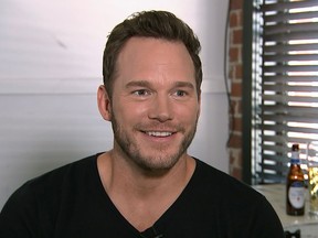 This Aug. 14, 2018 image taken from video shows actor Chris Pratt during an interview at the Fellow Bar in Los Angeles. Pratt met with disabled athletes as part of the nonprofit group Achilles International. He surprised them with the news that they're being sponsored in the New York City Marathon.