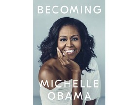 This cover image released by Crown shows "Becoming," by Michelle Obama, available on Nov. 13. Obama will visit 10 cities to promote her memoir "Becoming," a tour featuring arenas and other performing centers to accommodate crowds likely far too big for any bookstore. The former first lady will begin at the United Center in her native Chicago on Nov. 13, the book's release date.  (Crown via AP)