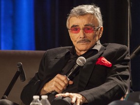 FILE - In this Aug. 22, 2015 file photo, Burt Reynolds appears at the Wizard World Chicago Comic-Con in Chicago. Reynolds, who starred in films including "Deliverance," "Boogie Nights," and the "Smokey and the Bandit" films, died at age 82, according to his agent.