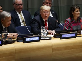 United Nations Secretary General Antonio Guterres, left, and U.S. Ambassador to the United Nations Nikki Haley, right, listen as President Donald Trump speaks during the "Global Call to Action on the World Drug Problem" at the United Nations General Assembly, Monday, Sept. 24, 2018, at U.N. Headquarters.