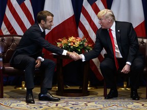 President Donald Trump meets with French President Emmanuel Macron at the Lotte New York Palace hotel during the United Nations General Assembly, Monday, Sept. 24, 2018, in New York.