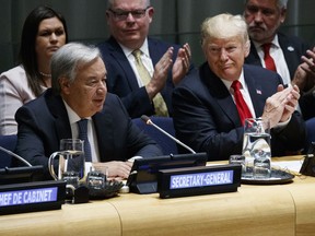 President Donald Trump listens as United Nations Secretary General Antonio Guterres speaks at the United Nations General Assembly, Monday, Sept. 24, 2018, at U.N. Headquarters.