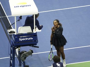 Serena Williams argues with the chair umpire during a match against Naomi Osaka, of Japan, during the women's finals of the U.S. Open tennis tournament at the USTA Billie Jean King National Tennis Center, Saturday, Sept. 8, 2018, in New York.
