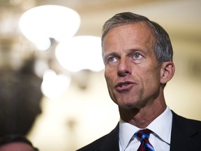 FILE - In this Sept. 5, 2018, file photo, Sen. John Thune, R-S.D., speaks with reporters after the Republican's policy luncheon on Capitol Hill in Washington. The Trump administration is hoping Congress can come up with a new set of national rules governing how companies can use consumers' data that finds a balance between "privacy and prosperity." "Consumers deserve clear answers and standards on data privacy protection," Thune, who heads the Commerce panel, said in a statement. By hearing from the companies, lawmakers will be able to assess "what Congress can do to promote clear privacy expectations without hurting innovation," he said.