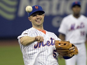 New York Mets third baseman David Wright (5) warms up before a baseball game between the New York Mets and the Miami Marlins, Saturday, Sept. 29, 2018, in New York.