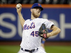 New York Mets' Zack Wheeler delivers a pitch during the first inning of a baseball game against the Miami Marlins Wednesday, Sept. 12, 2018, in New York.