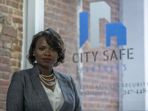 In this Sept. 7, 2018, photo Soyini Chan-Shue poses for a portrait at City Safe Partner's office in New York. Although Chan-Shue easily delegated work to police officers when she was a sergeant in the New York City Police Department, it was hard to relinquish tasks to employees of the security firm she now owns. "It can be nerve-wracking to give my staffers the autonomy to make decisions I formerly made, but I realized that I can't effectively grow my business if I don't," says Chan-Shue, CEO of City Safe Partners.