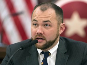 FILE- In this Nov. 10, 2014 file photo, New York City Councilman Corey Johnson speaks at a hearing in introducing legislation making it easier for transgender people to change the sex on their birth certificates. The New York City Council adopted legislation on Wednesday, Sept. 12, 2018, will allow people who don't identify as male or female to change the gender designation on their birth certificates to "X."