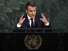 FILE - In this Sept. 19, 2017 file photo, President Emmanuel Macron of France addresses the 72nd session of the United Nations General Assembly, at U.N. headquarters. Macron is expected to be a key voice joining secretary-general Guterres in speaking out against the current trend of rising populism in the world and supporting multilateralism as key to promoting peace.