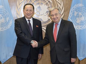 In this photo provided by the United Nations, Ri Yong Ho, left, Minister for Foreign Affairs, Democratic People's Republic of Korea, is greeted by United Nations Secretary General Antonio Guterres during the United Nations General Assembly, Friday, Sept. 28, 2018 at U.N. Headquarters.