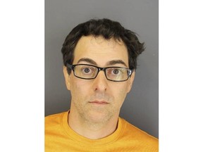 This undated photo provided by the Westchester County, N.Y., District Attorney's Office, shows Daniel Switzen, of Pleasantville, N.Y. Switzen, a former CNBC television director has been sentenced to five years' probation on Tuesday, Sept. 25, 2018, for spying on his family's nanny with a hidden camera in his suburban New York home. He pleaded guilty in May to unlawful surveillance. (Westchester County District Attorney's Office via AP)