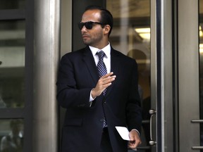 FILE - In this Friday, Sept. 7, 2018, file photo, former Donald Trump presidential campaign foreign policy adviser George Papadopoulos leaves federal court after he was sentenced to 14 days in prison, in Washington. Papadopoulos, who triggered the Russia investigation, is willing to testify before the Senate intelligence committee, Thomas Breen, his lawyer, said Wednesday, Sept. 12, 2018.