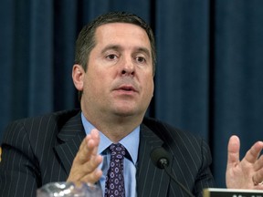 File-This April 12, 2018, file photo shows Rep. Devin Nunes, R-Calif. speaking during a committee hearing on Capitol Hill in Washington. The House intelligence committee chairman said Sunday, Sept. 16, 2018, he plans to release the transcripts of dozens of private interviews conducted during its investigation into Russian election-meddling and would push the director of national intelligence to declassify others. ``I think full transparency is in order here, so I expect to make those (transcripts) available from our committee to the American public here in the next few weeks,'' said Nunes, months after the GOP colleague who led the investigation said such a release could have a "chilling impact" on testimony in future inquiries.