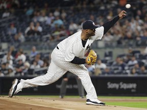 New York Yankees' CC Sabathia delivers a pitch during the first inning of a baseball game against the Baltimore Orioles Friday, Sept. 21, 2018, in New York.