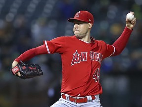 Los Angeles Angels pitcher Tyler Skaggs works against the Oakland Athletics during the first inning of a baseball game Tuesday, Sept. 18, 2018, in Oakland, Calif.