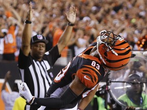 Cincinnati Bengals wide receiver Tyler Boyd (83) celebrates after scoring a touchdown in the first half of an NFL football game against the Baltimore Ravens, Thursday, Sept. 13, 2018, in Cincinnati.