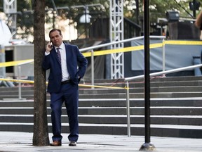 Cincinnati Mayor John Cranley stands at the scene as emergency personnel and police respond to reports of a shooting near Fountain Square, Thursday, Sept. 6, 2018, in downtown Cincinnati.