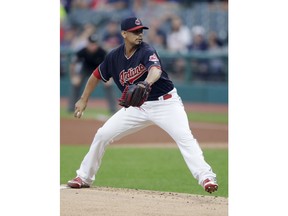 Cleveland Indians starting pitcher Carlos Carrasco delivers in the first inning of a baseball game against the Chicago White Sox, Wednesday, Sept. 19, 2018, in Cleveland.