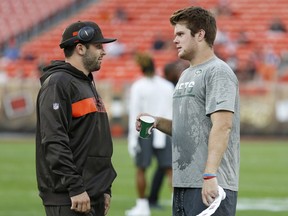 Cleveland Browns quarterback Baker Mayfield, left, talks with New York Jets quarterback Sam Darnold before an NFL football game between the Browns and the Jets, Thursday, Sept. 20, 2018, in Cleveland.