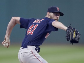 Boston Red Sox starting pitcher Chris Sale delivers in the first inning of the team's baseball game against the Cleveland Indians, Friday, Sept. 21, 2018, in Cleveland.
