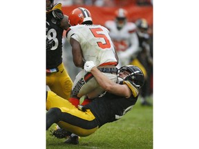Pittsburgh Steelers linebacker T.J. Watt (90) sacks Cleveland Browns quarterback Tyrod Taylor (5) during the second half of an NFL football game, Sunday, Sept. 9, 2018, in Cleveland.