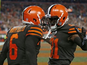 Cleveland Browns quarterback Baker Mayfield (6) and wide receiver Rashard Higgins (81) celebrate a 2-point conversion during the second half of an NFL football game against the New York Jets, Thursday, Sept. 20, 2018, in Cleveland.