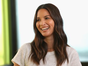 Olivia Munn, hero, doing press at TIFF for The Predator.