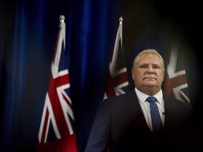 Toronto's mayor says the city must convey its "strong dissatisfaction" over the Ontario government's move to slash the size of municipal council when local politicians and staff hold a meeting next week to discuss a potential court challenge to the province's decision.